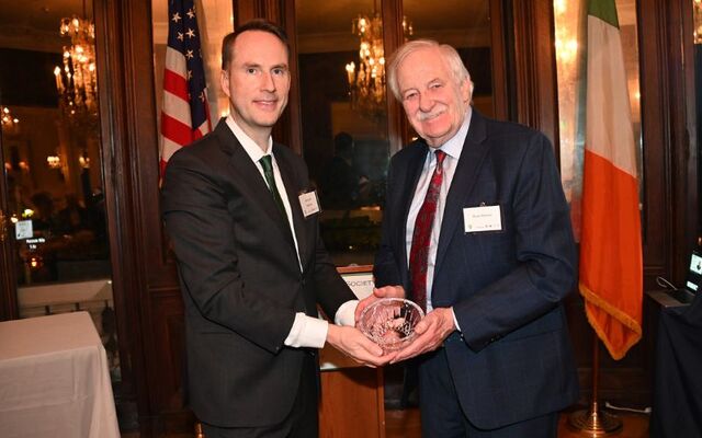 IrishCentral Chair Liam Lynch presents keynote speaker Bruce Morrison with a Lifetime Achievement Award at the IrishCentral Legal Elite Awards 2024, in New York.