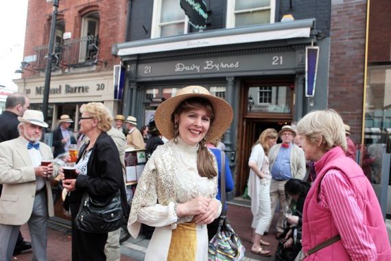 June 16, 2015: Carole Ward om Walkinstown enjoys the festivities of Bloomsday outside Davy Byrne's pub on Duke Street in Dublin and was made famous in James Joyce's novel 'Ulysses.' (RollingNews.ie)
