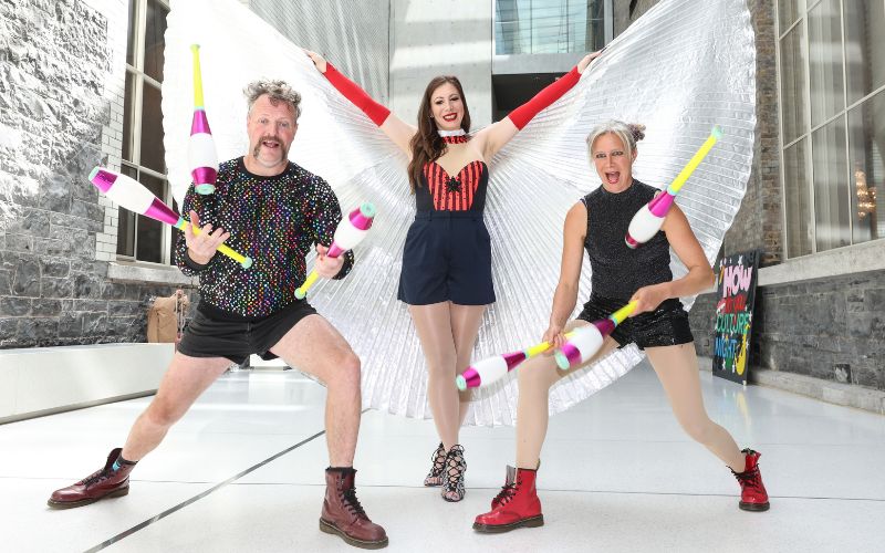 August 6, 2024: Circus performer Karen Dunn (centre) with Ken Fanning and Tina Segner from Tumble Circus launch Culture Night 2024 in the Atrium at The National Gallery of Ireland, with a mural by artist Klo Wi. (RollingNews.ie) August 6, 2024: Circus performer Karen Dunn (centre) with Ken Fanning and Tina Segner from Tumble Circus launch Culture Night 2024 in the Atrium at The National Gallery of Ireland, with a mural by artist Klo Wi. (RollingNews.ie)